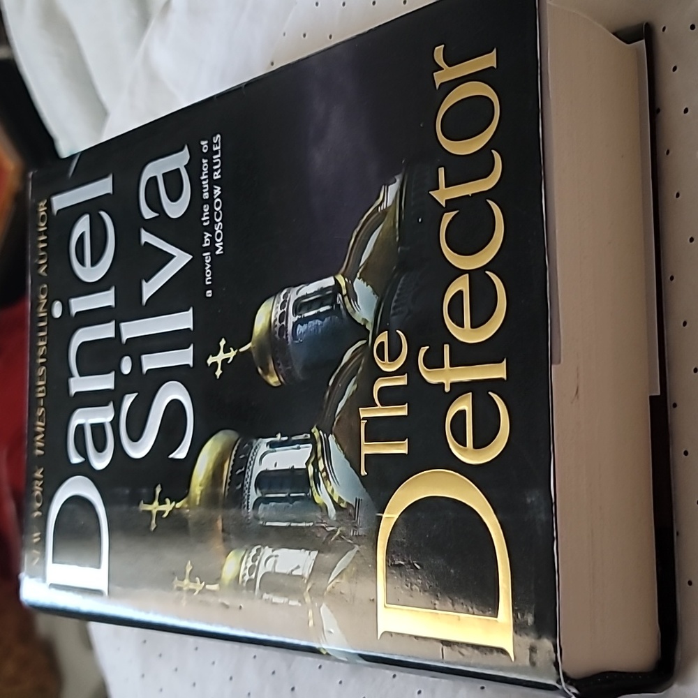 The Defector is a 2009 spy novel by Daniel Silva.Hardcover Edition